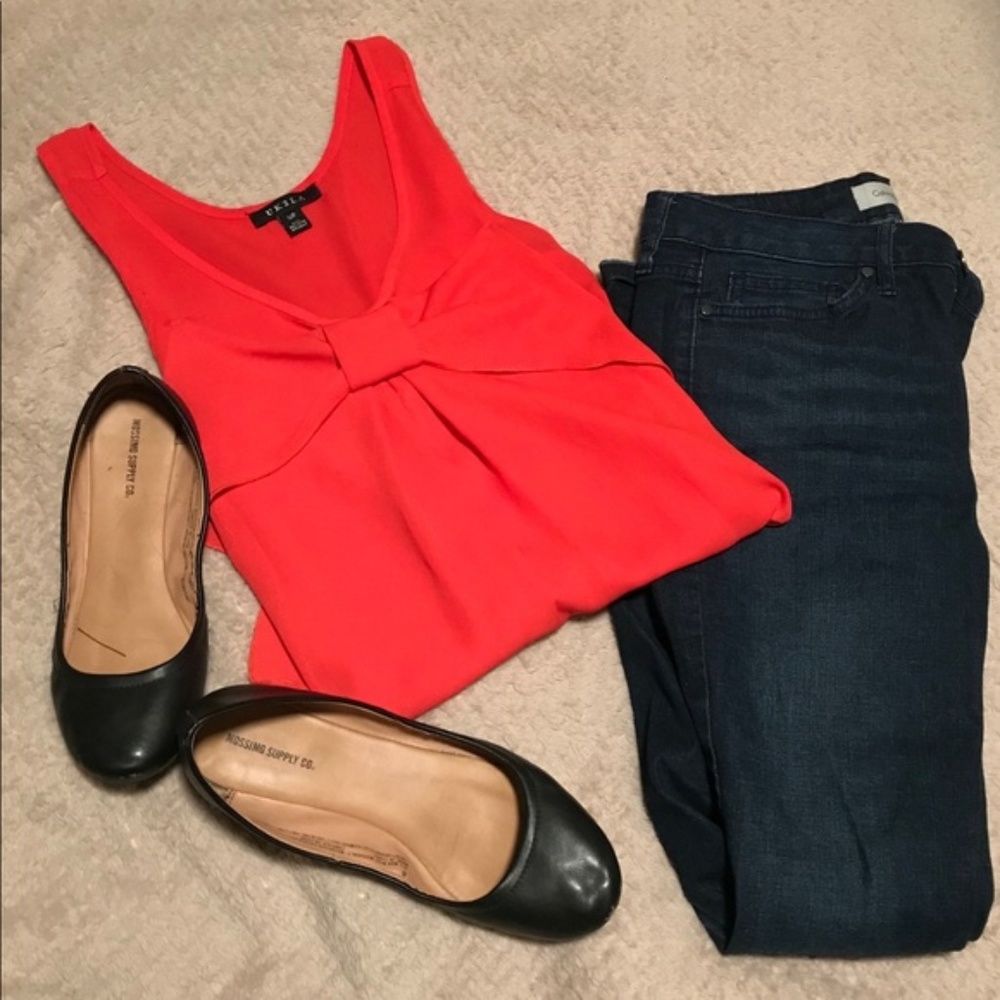 Red sleeveless blouse tank with large bow in front